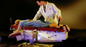 This is a picture of Cox Technic chiropratic spinal manipulation as performed at OrthoIllinois Chiropractic.